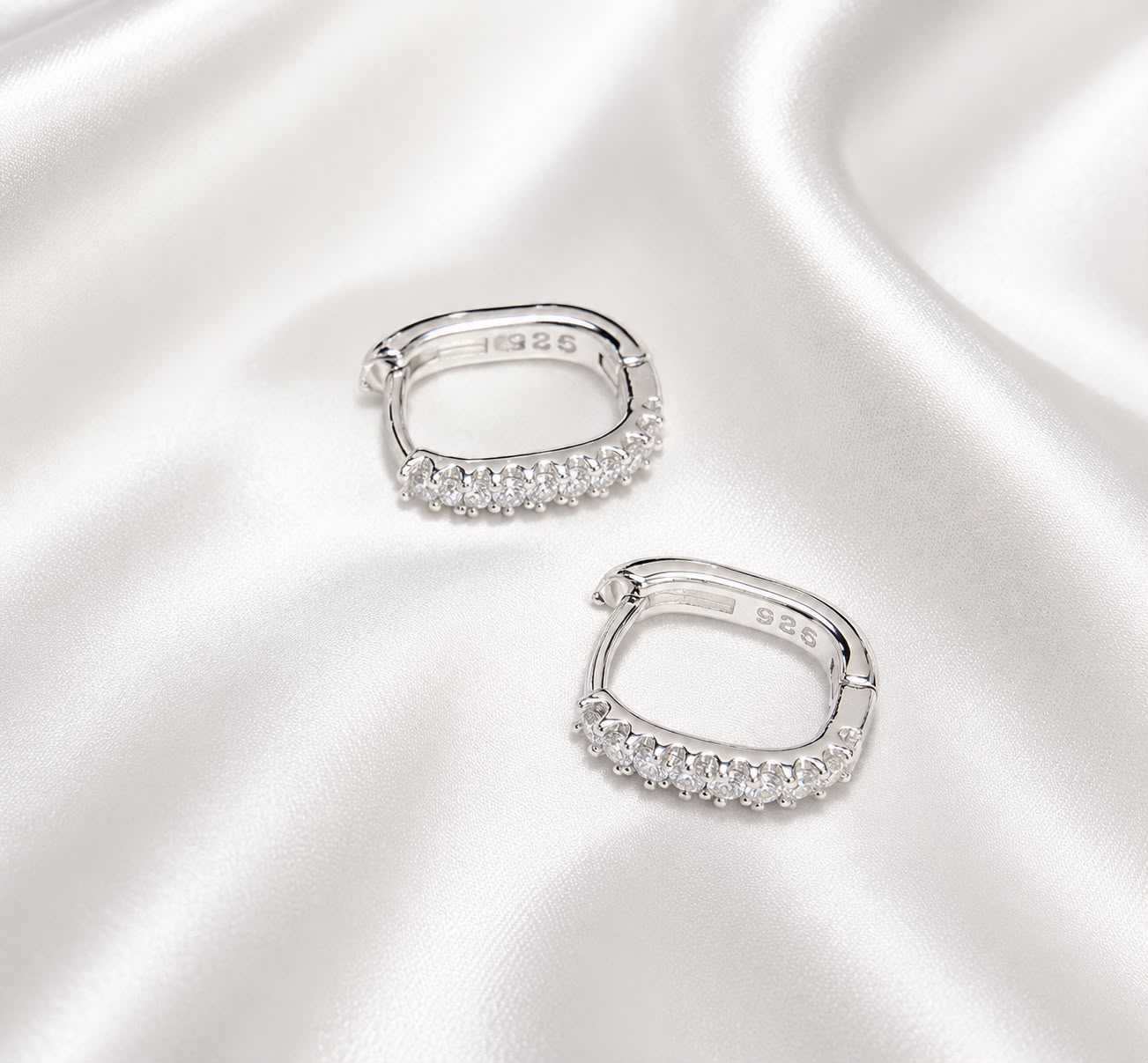 925 sterling silver plated Cinderella huggie hoop earrings set with clear stones