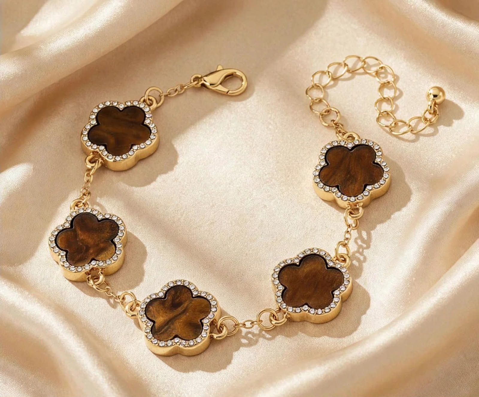 brown glitz clove bracelet on satin fabric