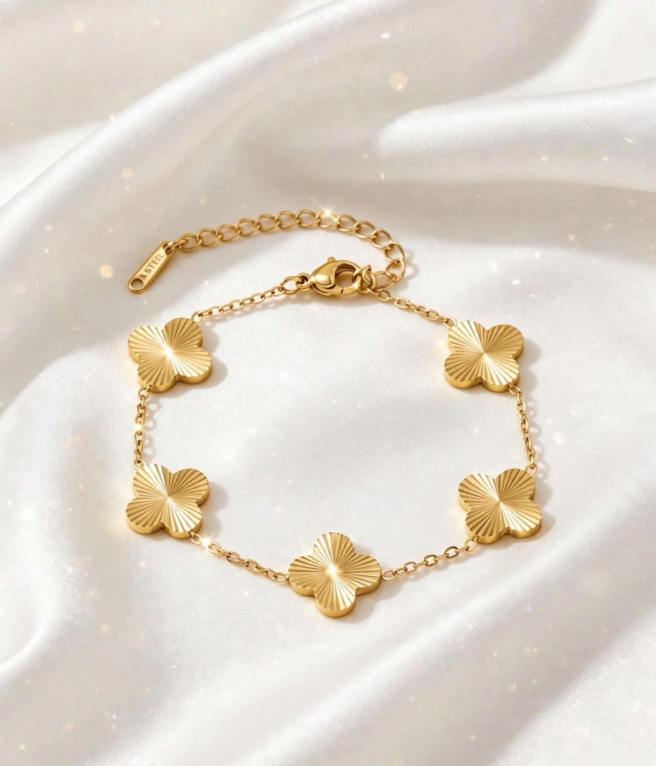 clove filled bracelet with textured detailing on satin fabric