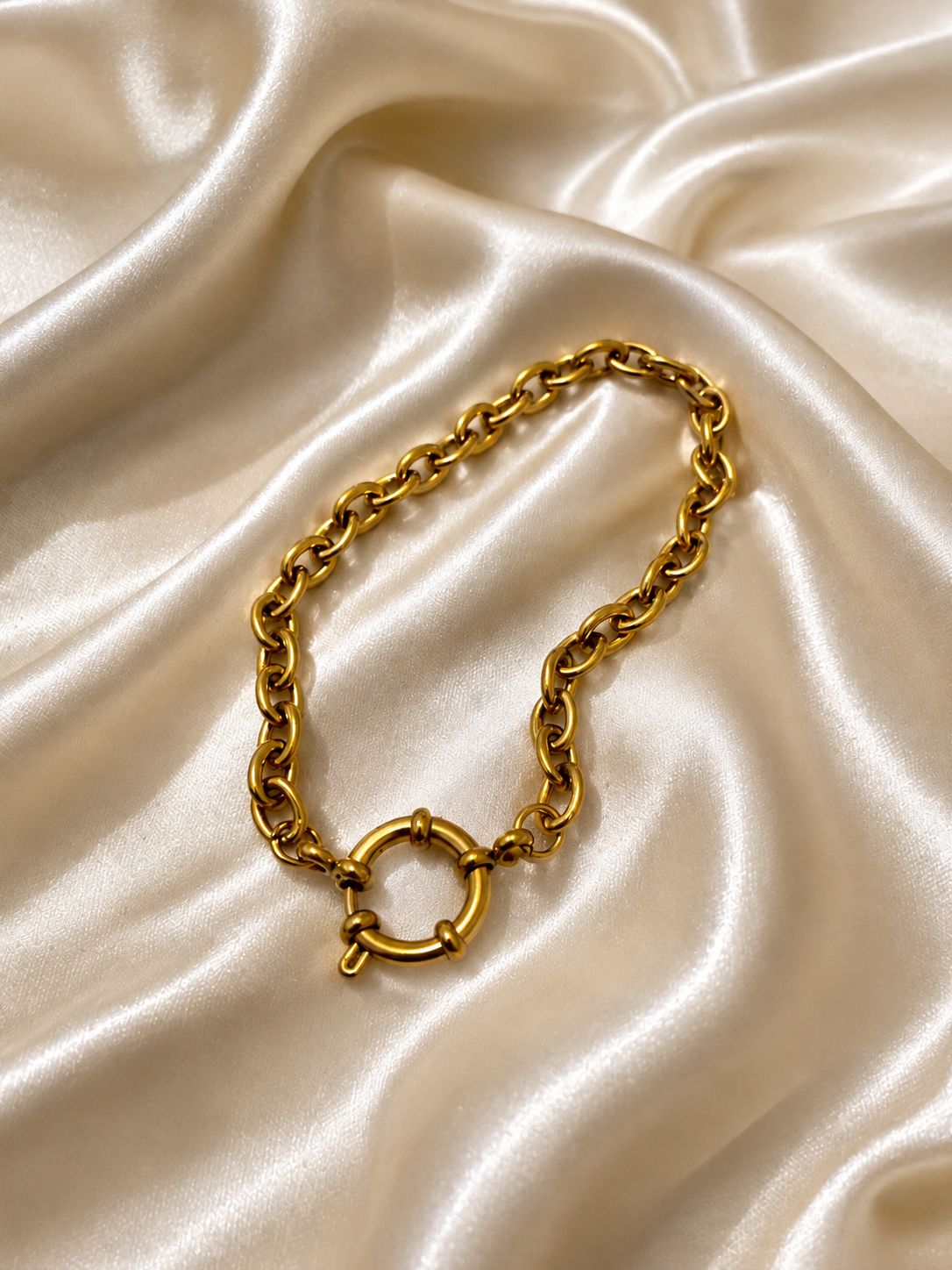gold rolo chain sailor bracelet tarnish resistant on satin fabric