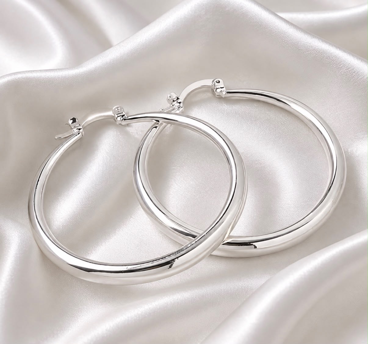 pair of 40mm polished silver plated Aria hoop earrings