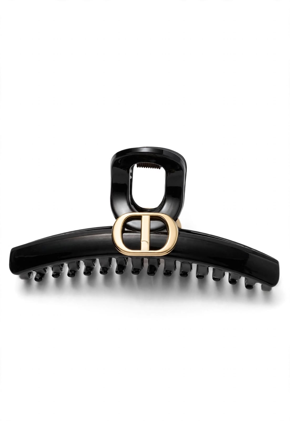 black DD hair claw clip with a gold-tone emblem on white background