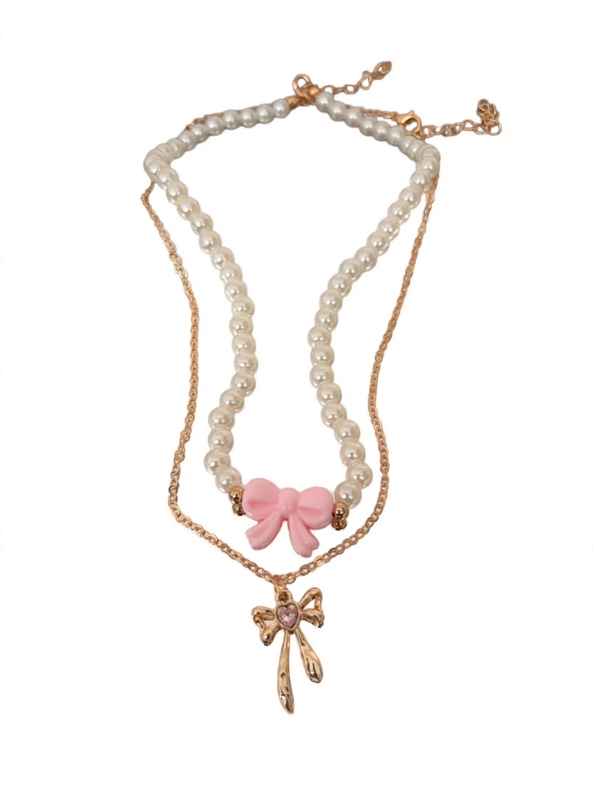 kids pearl-style bead necklace with a pink bow and a gold-tone chain with a bow pendant on white background