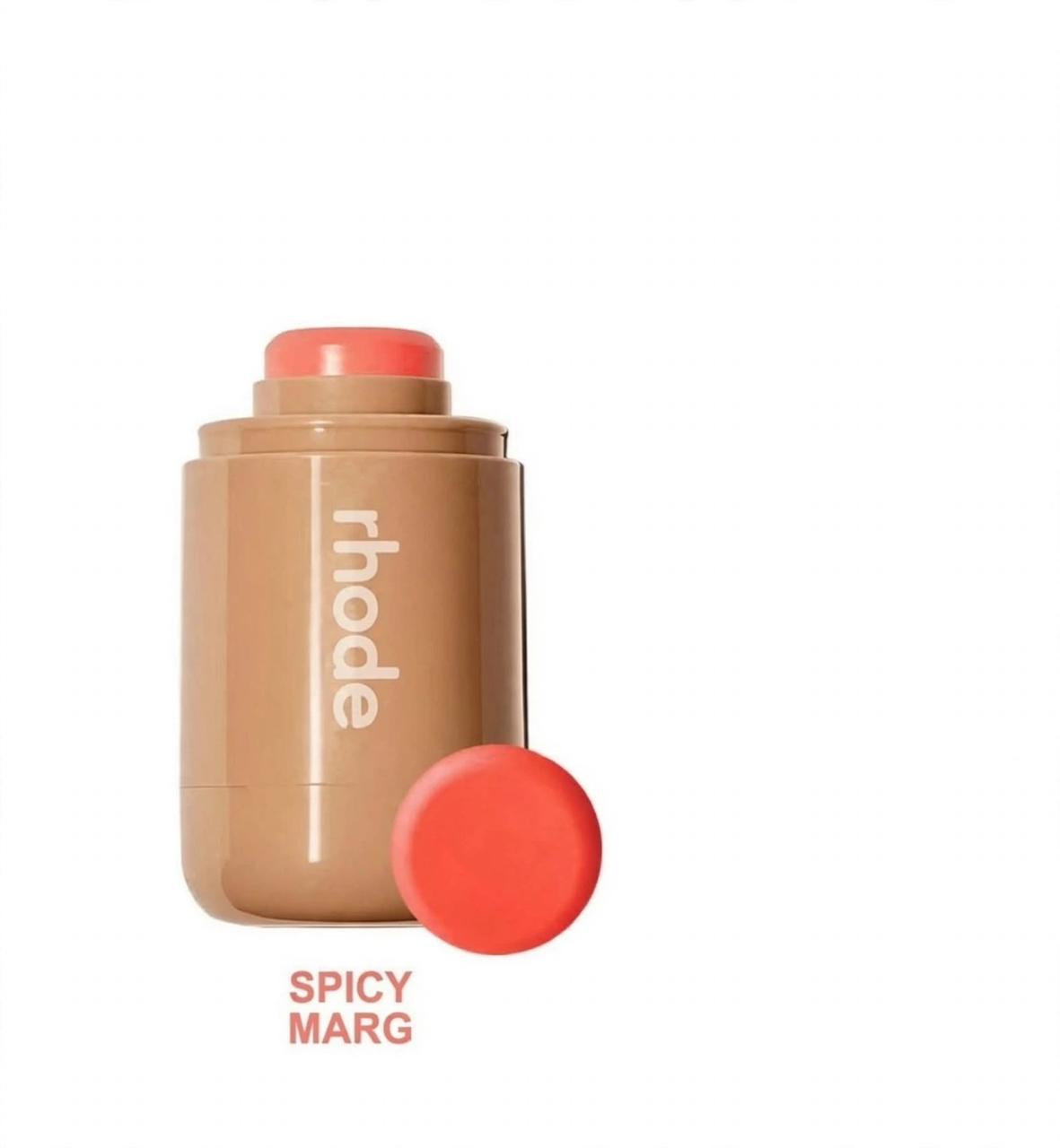 Rhode Pocket Blush stick in Spicy Marg, a warm coral, on white background